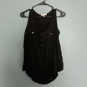 Black sleeveless top w/ button details